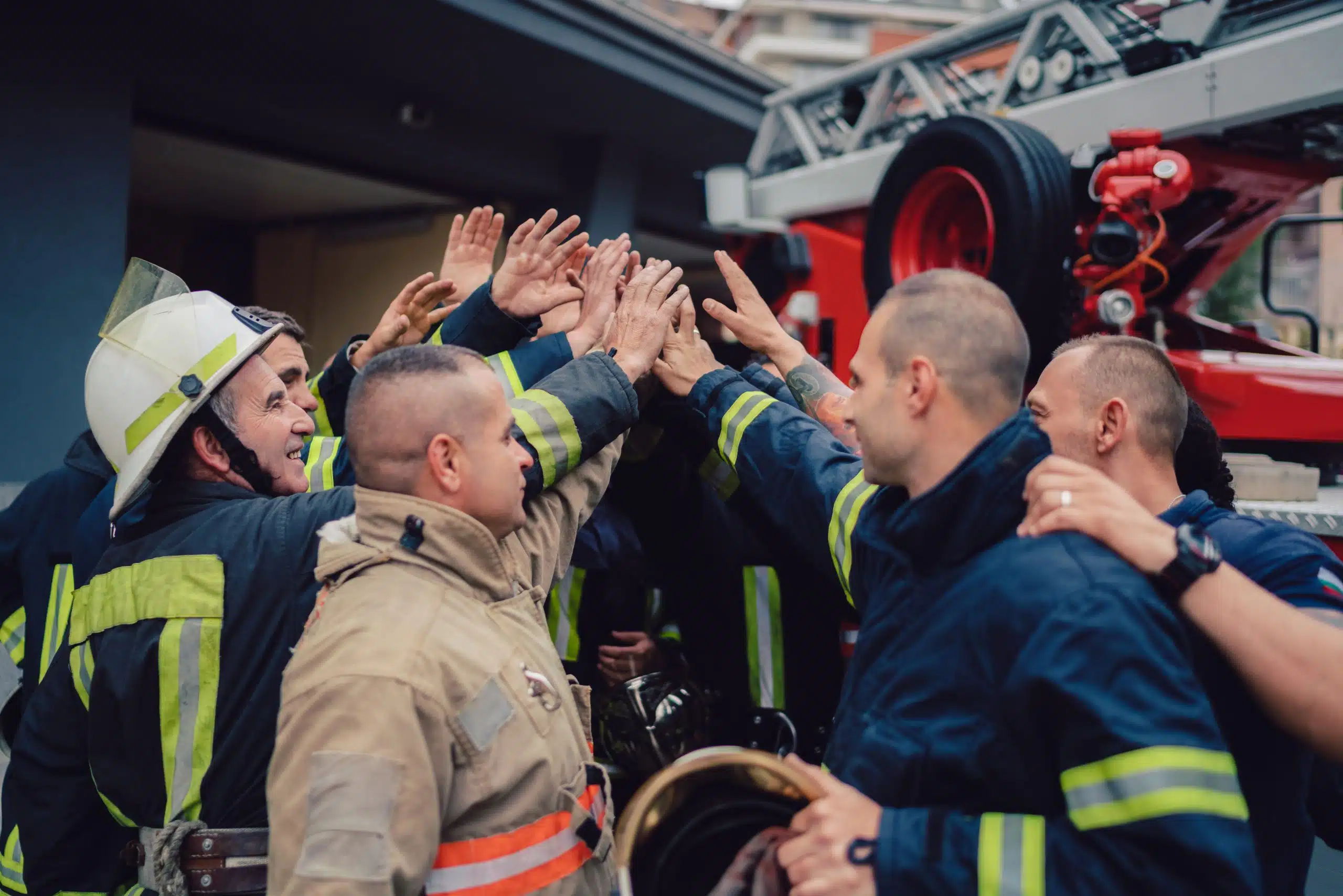 firefighters-putting-hands-together
